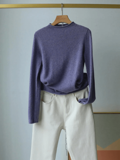 Pairing cashmere sweaters with jeans or trousers for a timeless look